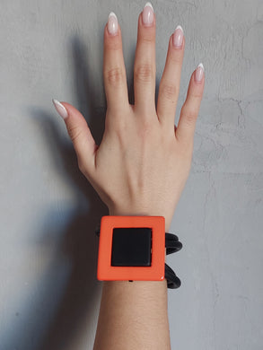 Bracciale arancio e nero