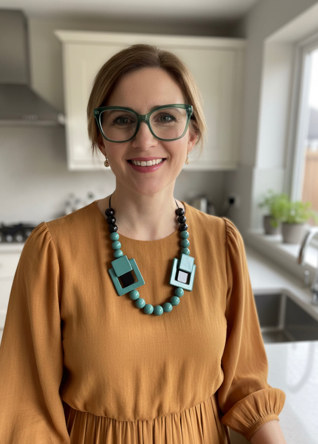 Collana open eyes verde petrolio