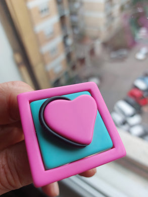 Anello cuore fuxia e verde acqua marina