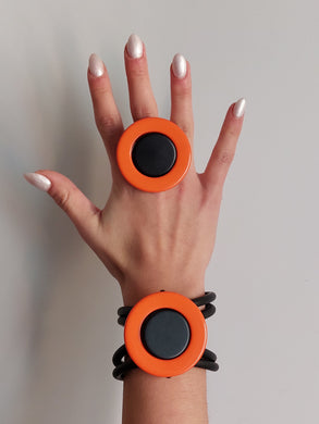 Parure saturn arancio e nero